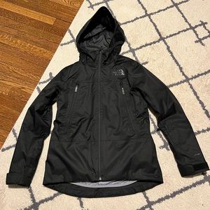 The North Face two in one jacket, new without tags, size M. Black and gray.